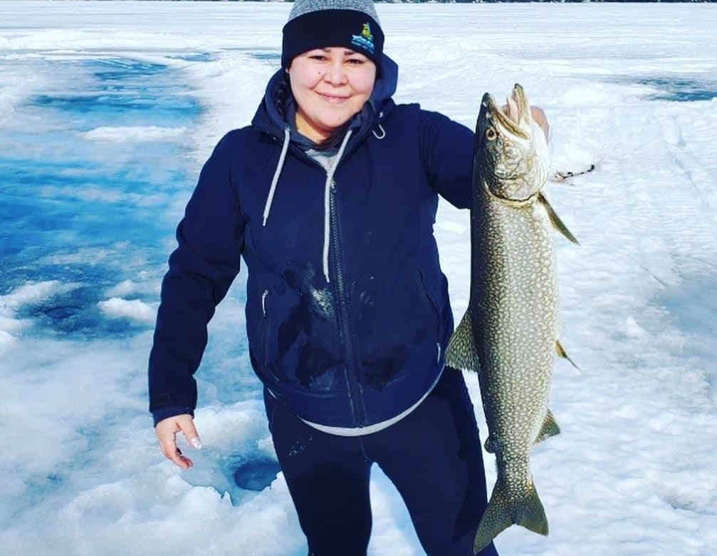 Woman Ice Fishing 